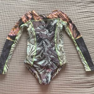 Maaji little girl long sleeve. Cut out back.